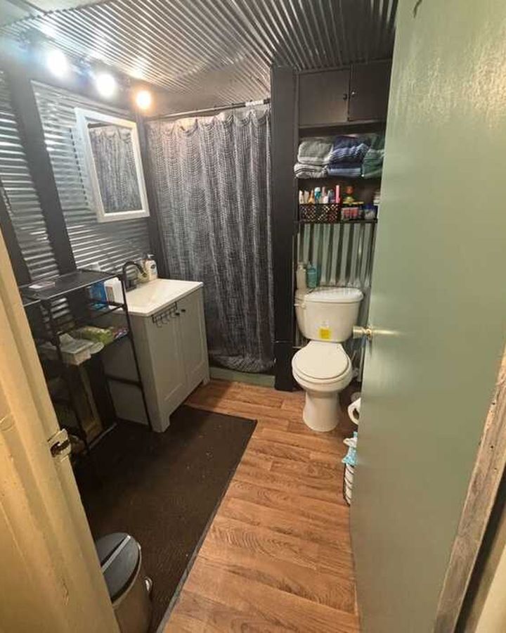 Refreshed bathroom with new vanity and floor